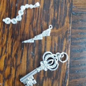 Misc silver tone pendants